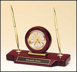 bc854 - Desk Clock with double pen set on brass and piano-finish rosewood base.
